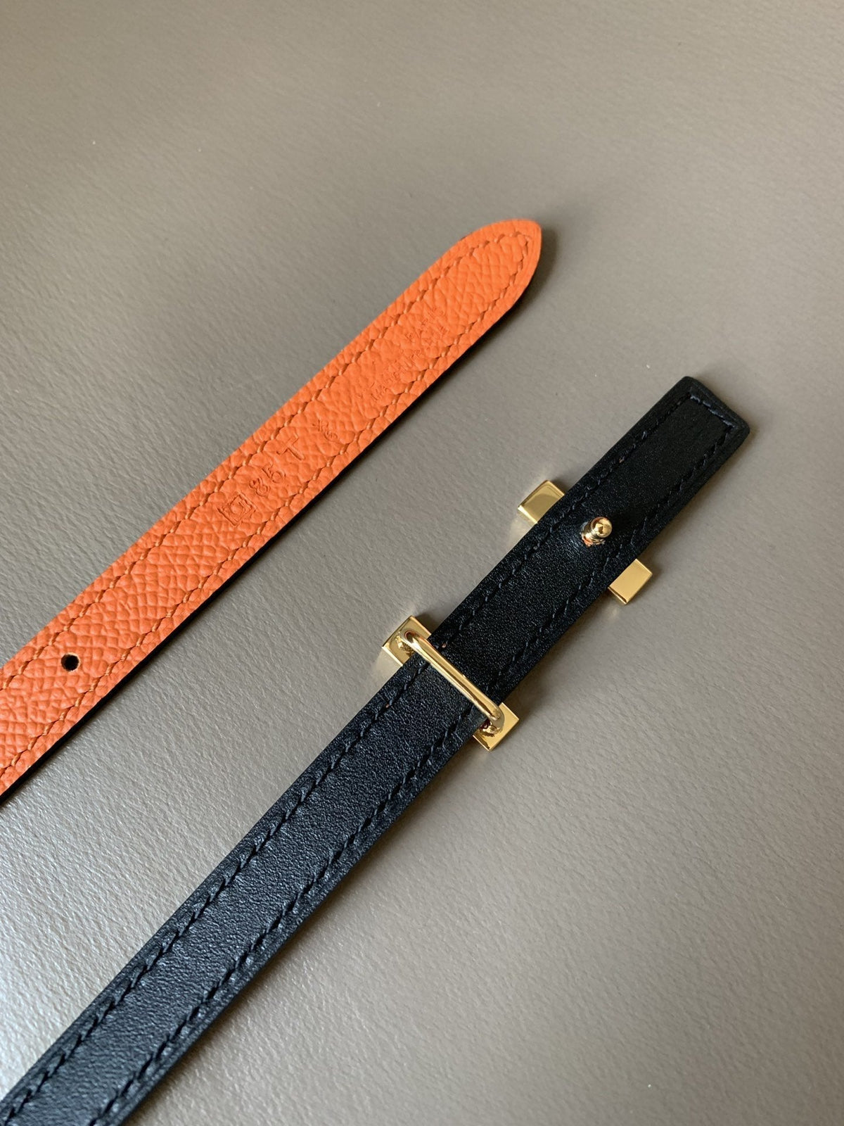 FOCUS BELT GOLD BUCKLE ORANGE AND BLACK REVERSIBLE LEATHER 1.3CM.