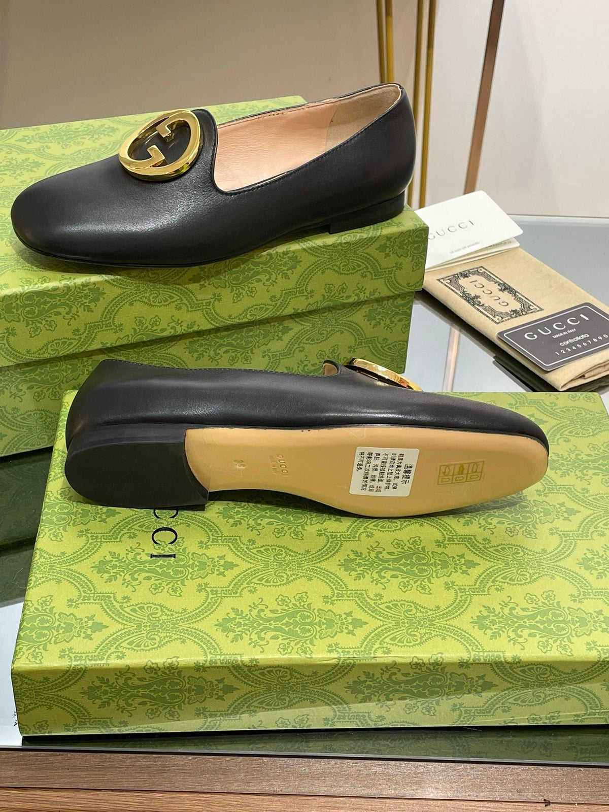 BLONDIE LOGO-PLAQUE LOAFERS IN BLACK CALFSKIN