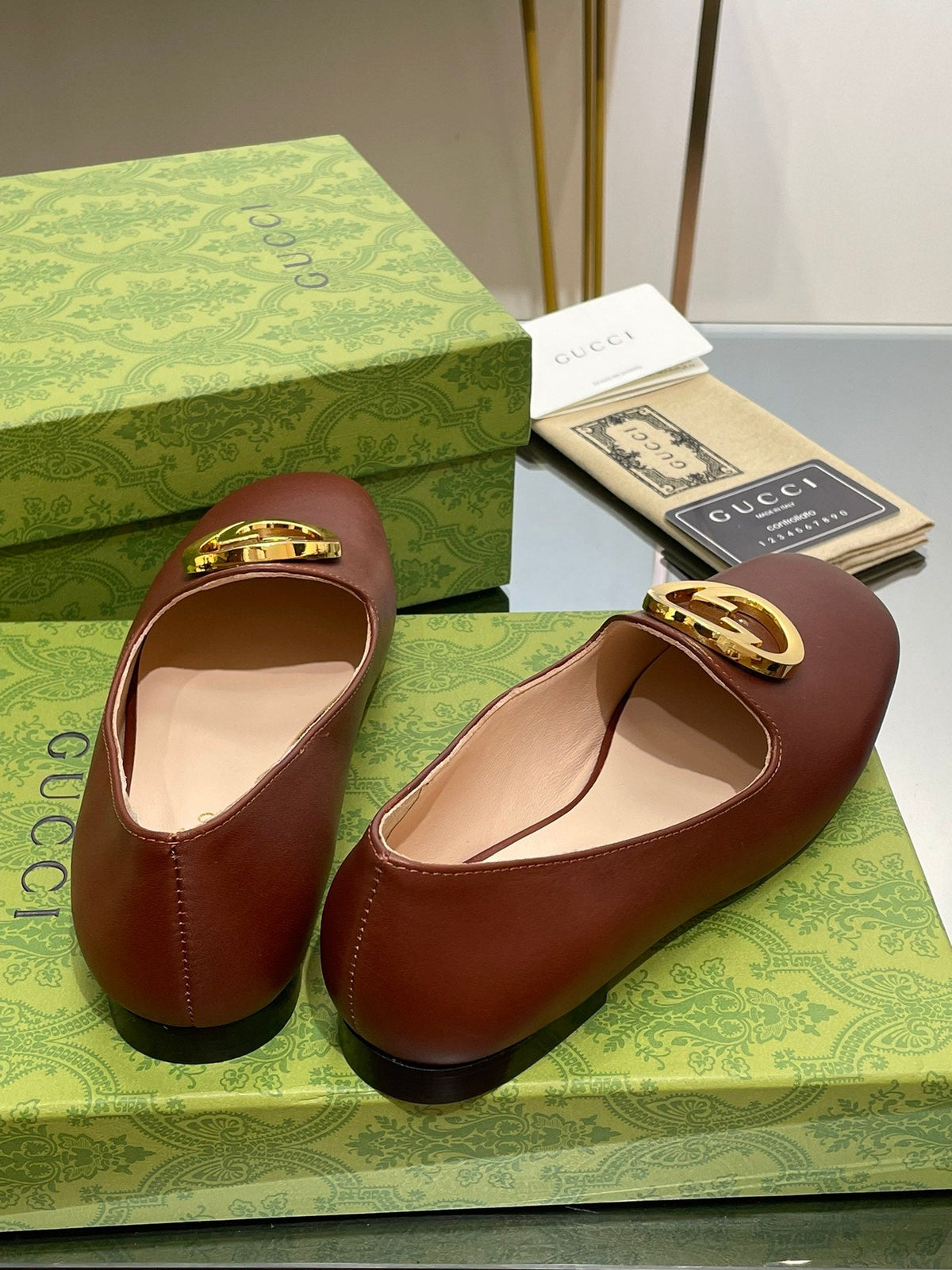 BLONDIE LOGO-PLAQUE LOAFERS IN SYRUP BROWN CALFSKIN