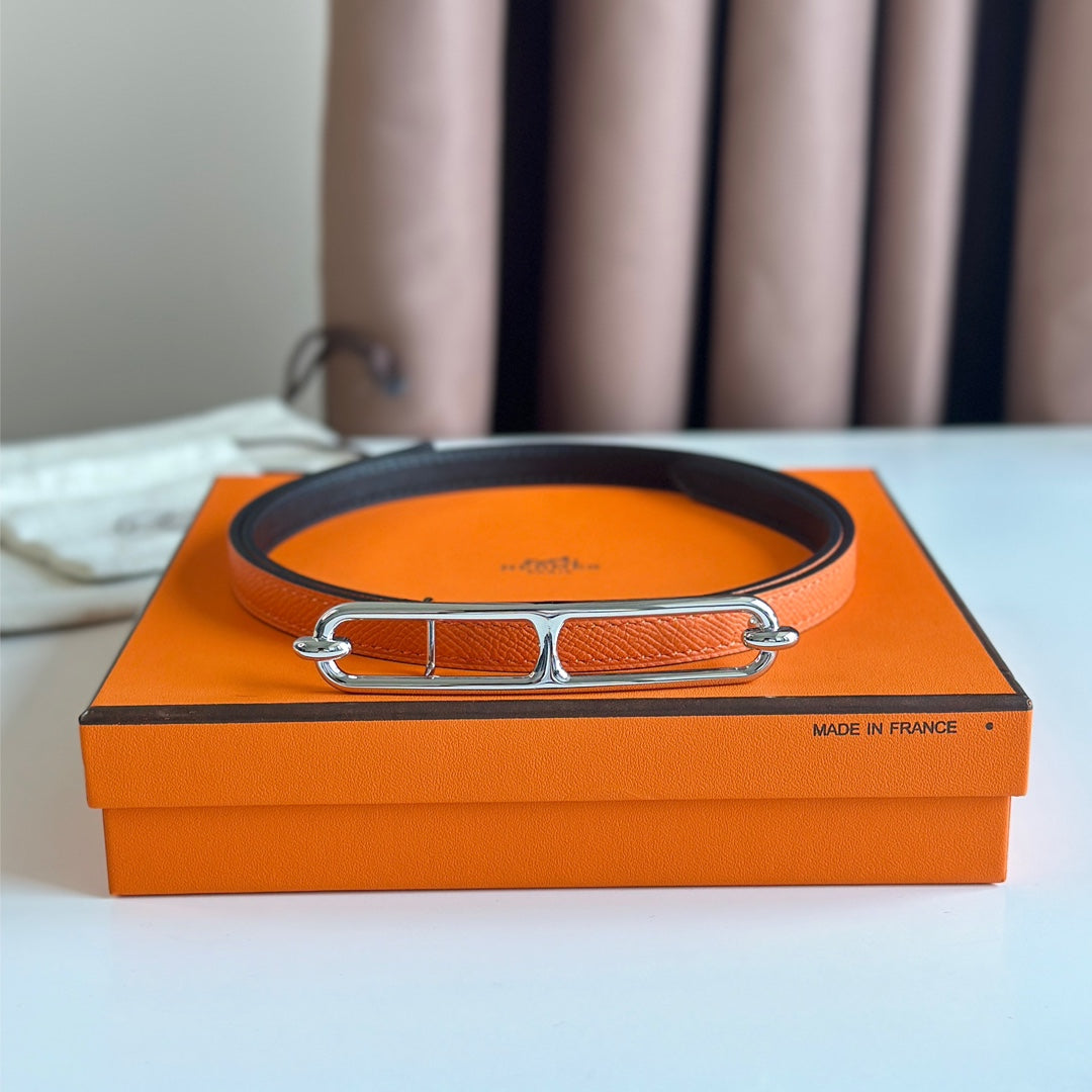 HM ROULIS BUCKLE & REVERSIBLE ORANGE AND BLACK LEATHER STRAP 13MM SILVER HARDWARE