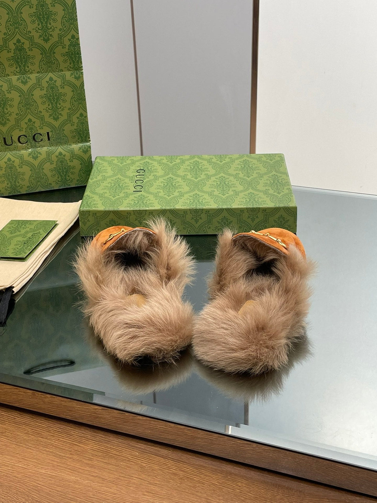 HORSEBIT MULE IN BRONZE ORANGE SUEDE AND LAMB WOOL LINING