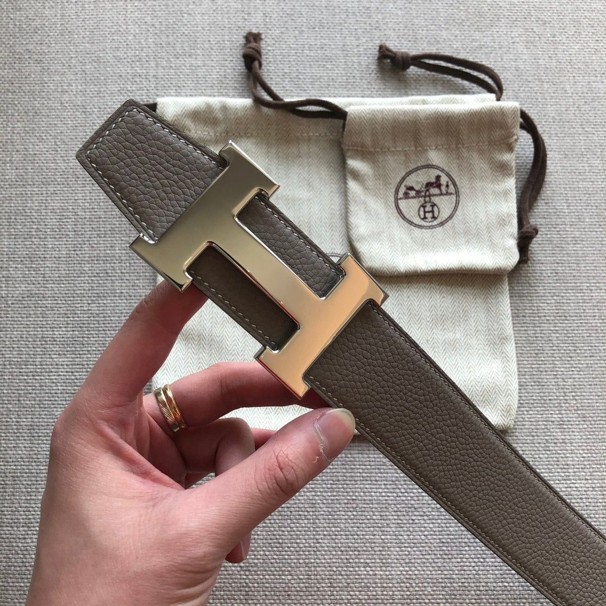 HM BELT BUCKLE & REVERSIBLE BLACK AND TAN BROWN LEATHER STRAP 38MM SILVER HARDWARE