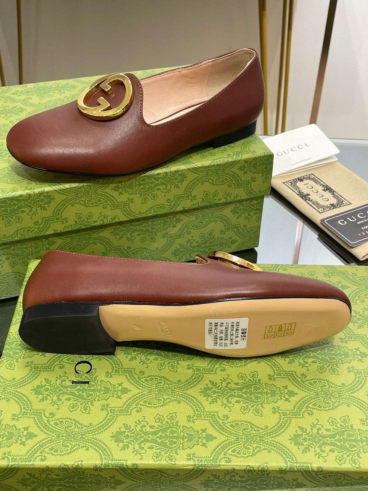 BLONDIE LOGO-PLAQUE LOAFERS IN SYRUP BROWN CALFSKIN