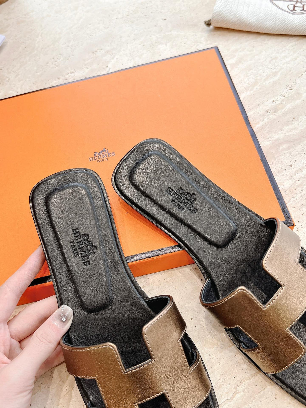 HM 25 Oran Sandal Black Copper Metalic Calfskin