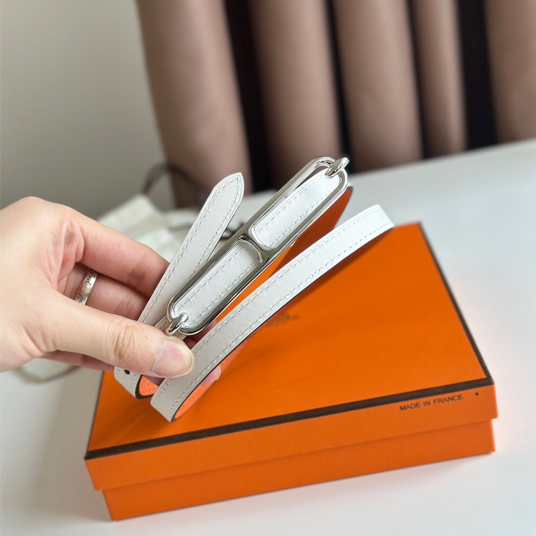 HM ROULIS BUCKLE & REVERSIBLE ORANGE AND WHITE LEATHER STRAP 13MM SILVER HARDWARE