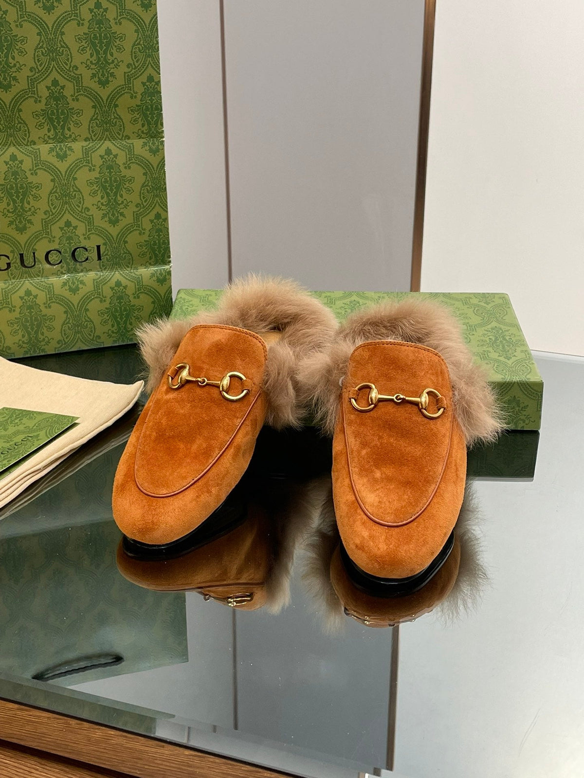 HORSEBIT MULE IN BRONZE ORANGE SUEDE AND LAMB WOOL LINING
