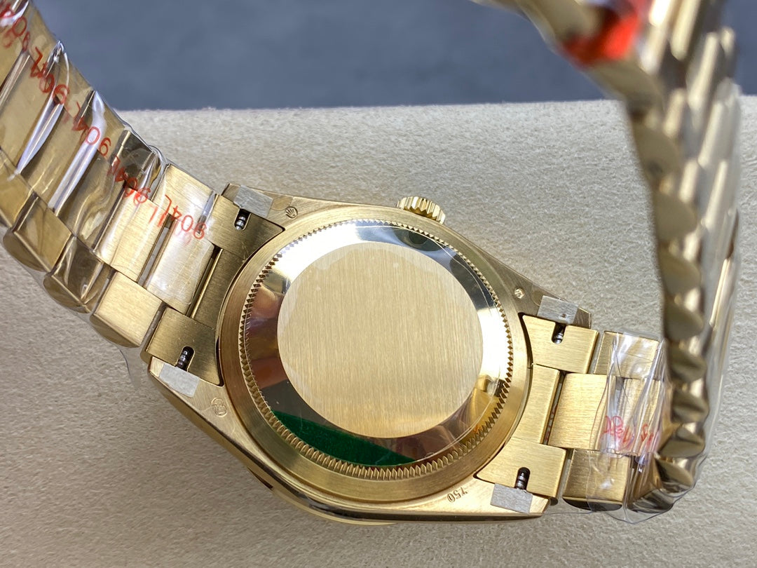 Rolex Day-Date 36mm Gold Orange Dial
